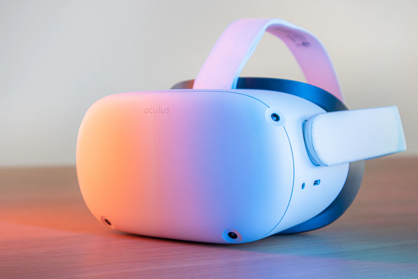 A white standalone virtual reality headset resting on a table